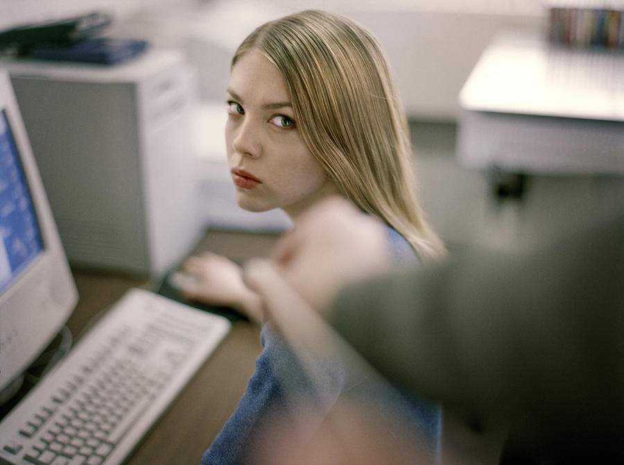 Woman At Desk Giving Dirty Look To Prankster. Photograph by David Sacks