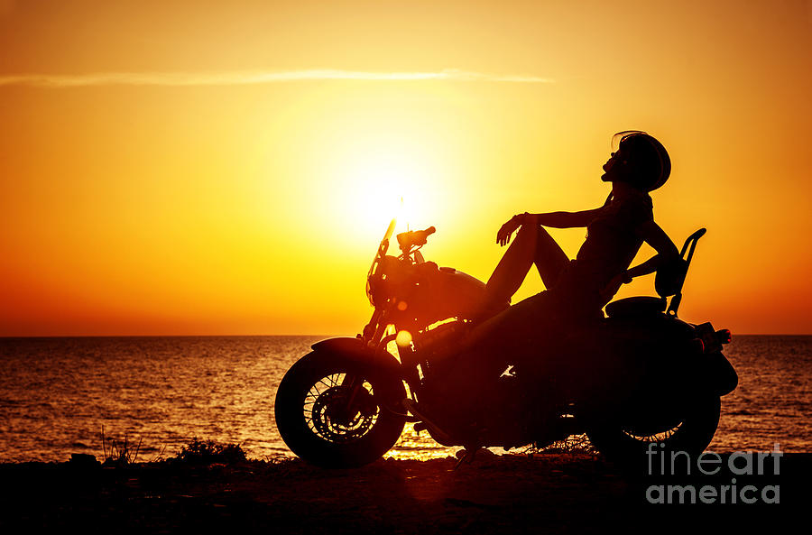 Woman biker enjoying sunset Photograph by Anna Om