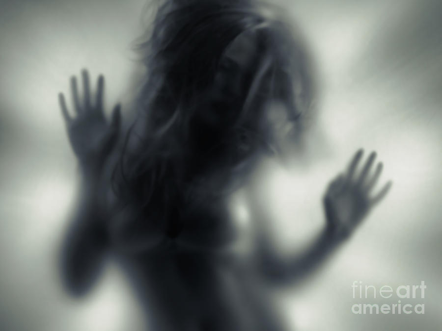 Woman blurred silhouette behind glass Photograph by Maxim Images Exquisite Prints