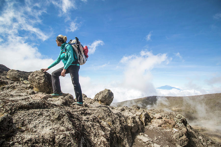 Woman Climber Standing On Rocks Photograph by Suzanne Stroeer - Fine ...