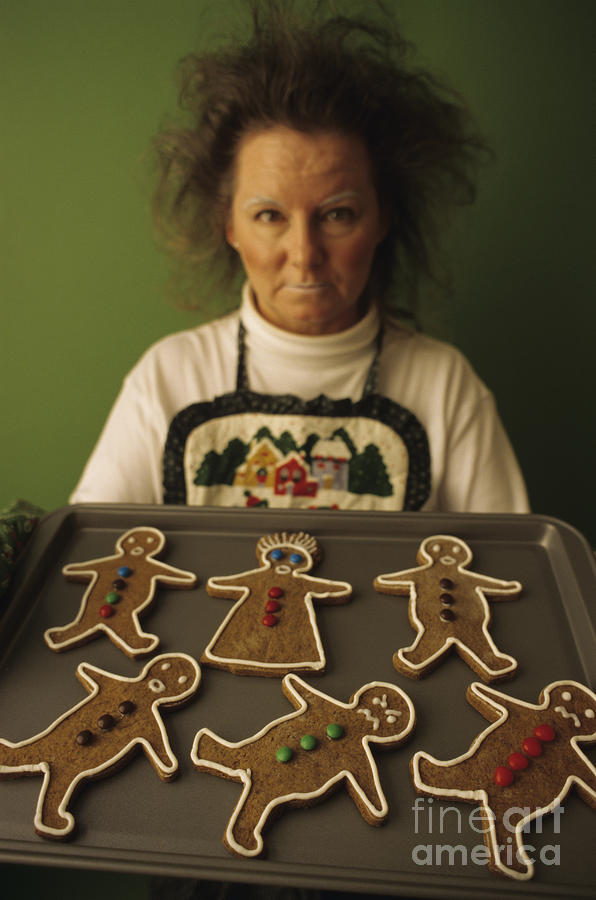 Woman Cooking Gingerbread Cookies Photograph by Jim Corwin