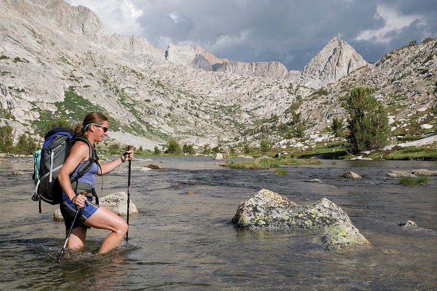 Kings Canyon National Park Photograph - Woman Crosses Evolution Creek On John by Josh Miller