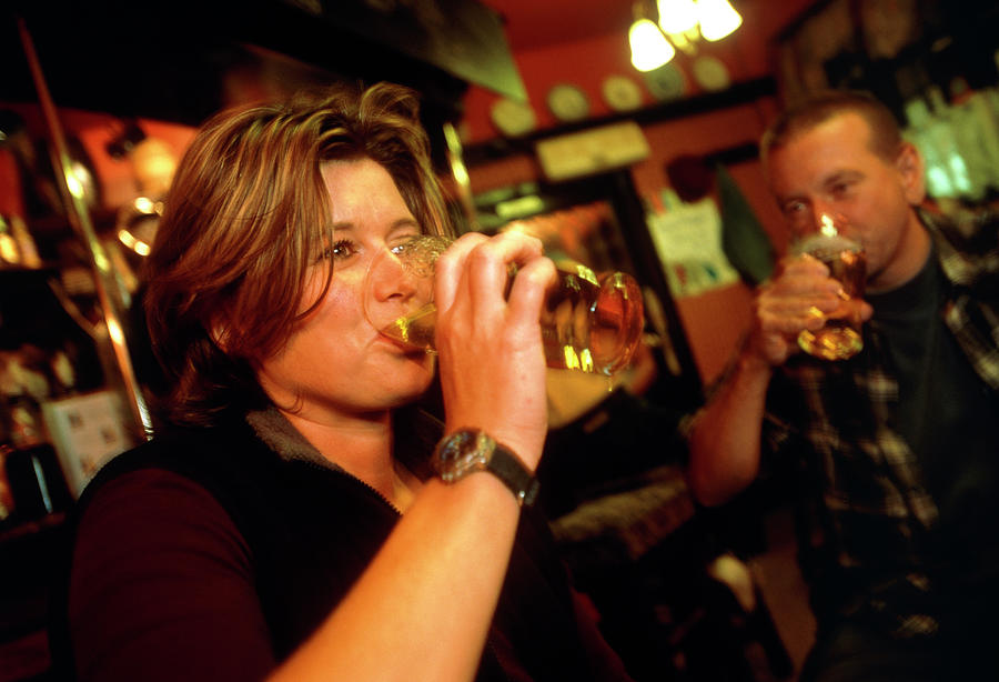 Woman Drinking Beer Photograph by Jim Varney/science Photo Library
