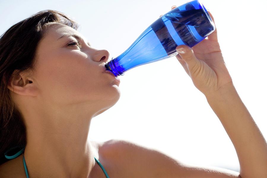 Woman Drinking Photograph By Ian Hooton Science Photo Library Pixels