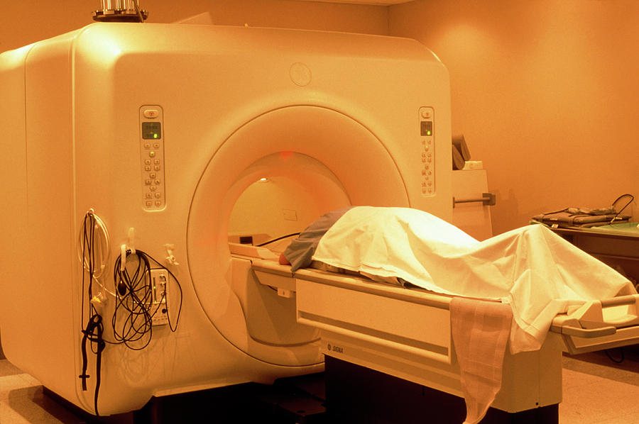 Woman During A Magnetic Resonance Imaging Scan Photograph by Mauro Fermariello/science Photo Library
