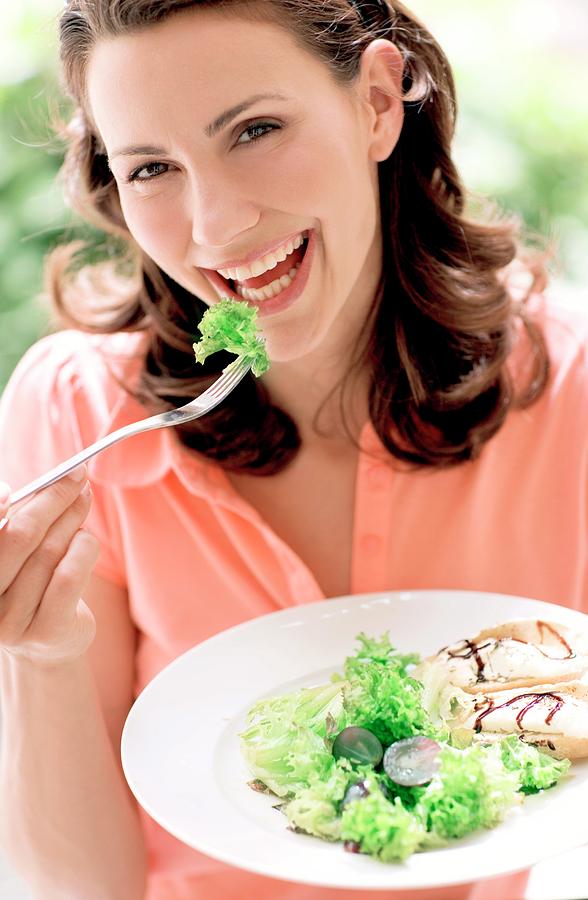 Woman Eating A Salad Photograph By Ian Hootonscience Photo Library