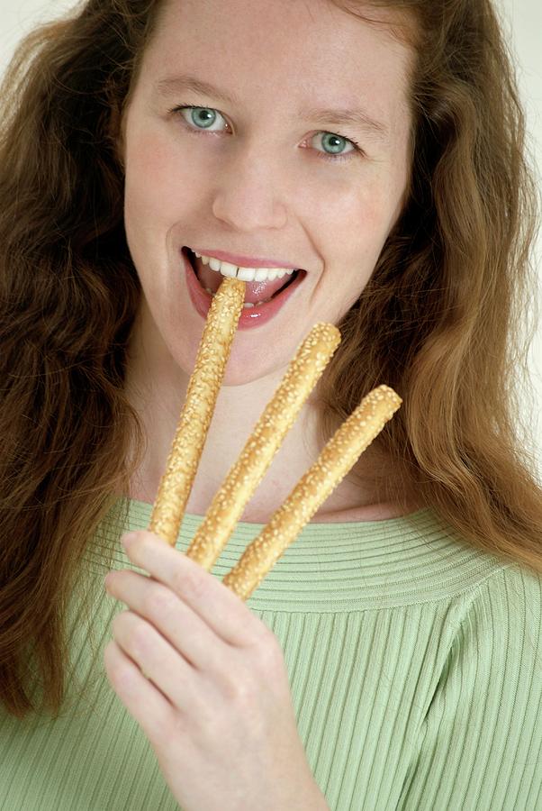 Woman Eating Bread Sticks Photograph by Science Photo Library Woman Eating Bread Sticks Photograph by Science Photo Library