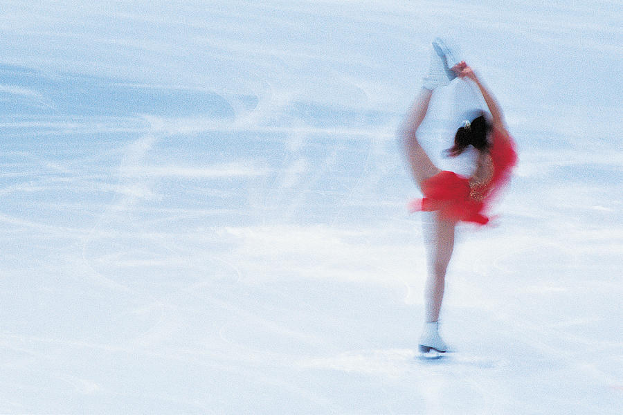 Woman Figure Skating Photograph by Digital Vision.