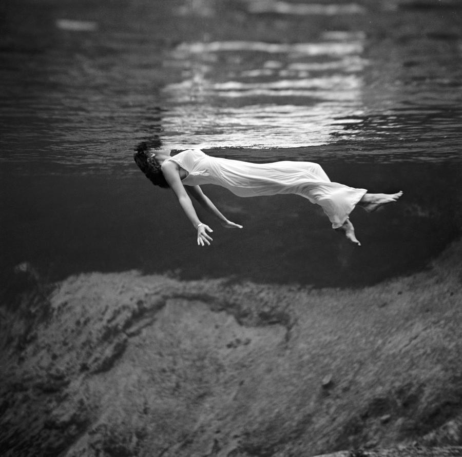 Woman Floating, 1947 Photograph by Granger
