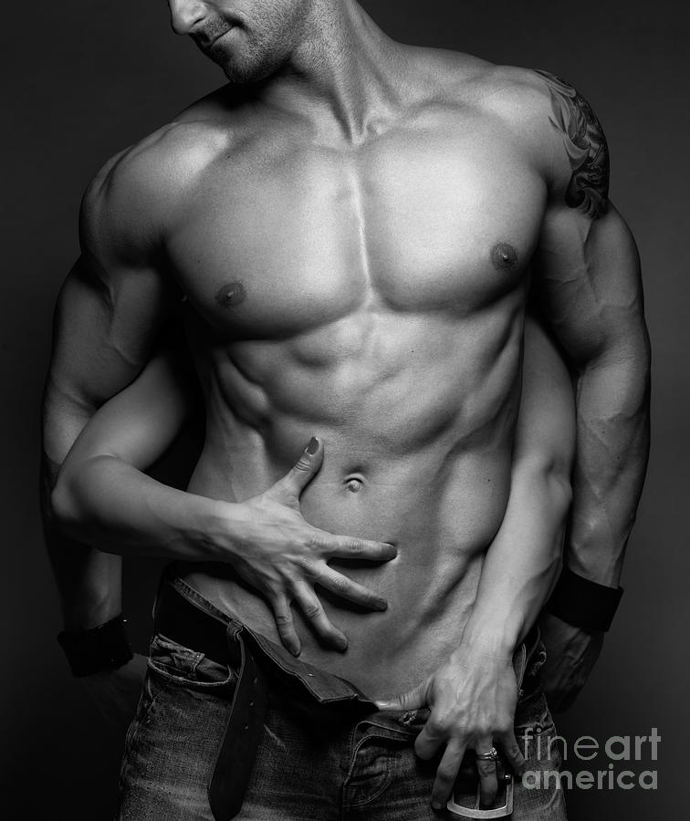 Black And White Photograph - Woman hands touching muscular mans body by Maxim Images Exquisite Prints