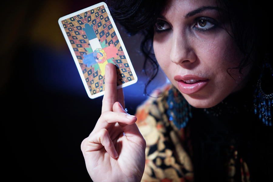 Woman Holding A Tarot Card Photograph by Ron Koeberer - Fine Art America