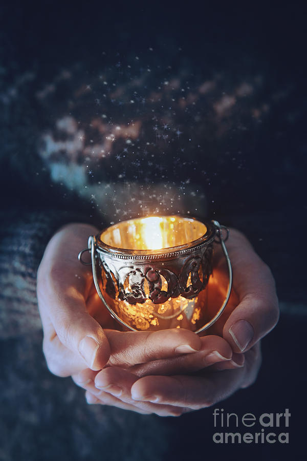 Woman holding a votive candle in her hands Photograph by Sandra Cunningham