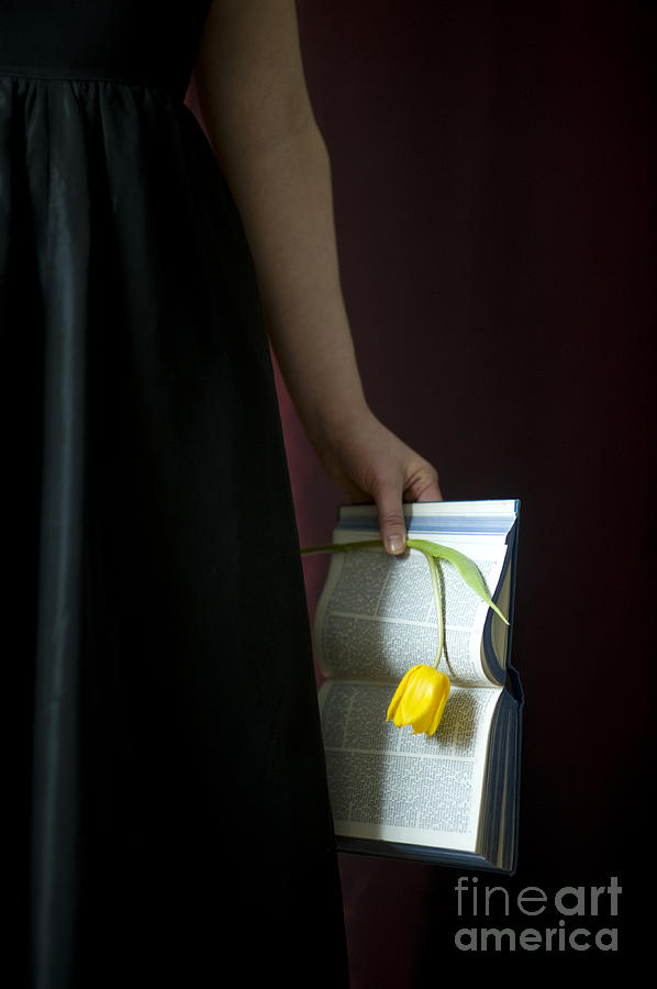 Woman Holding Bible And Tulip Photograph by Lee Avison