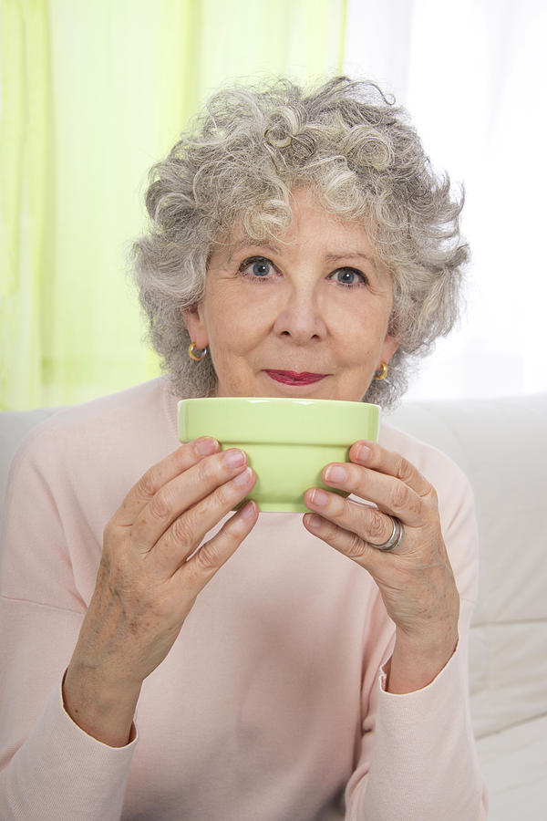 Woman Holding Bowl Photograph By Lea Paterson Science Photo Library