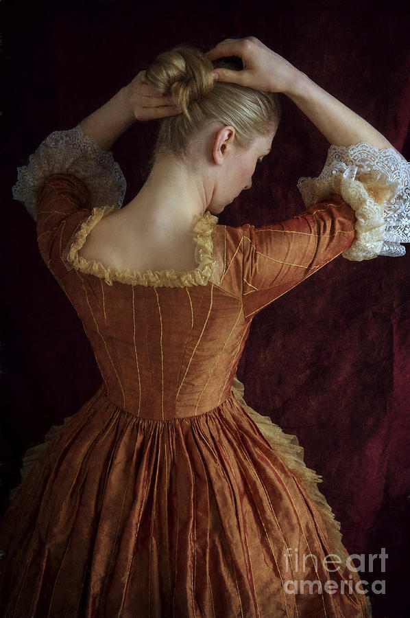 Woman In A Georgian Period Dress Doing Her Hair Photograph by Lee Avison