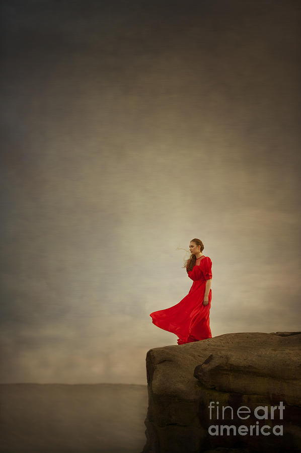 Woman In A Red Dress On A Clifftop Photograph by Lee Avison