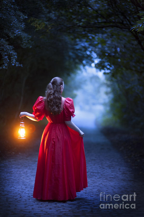 Woman In A Vintage Red Dress Holding A Lantern Photograph by Lee Avison