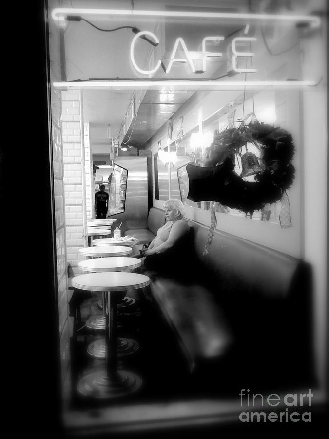Christmas Photograph - Christmas Eve - Woman in Cafeteria Window by Miriam Danar