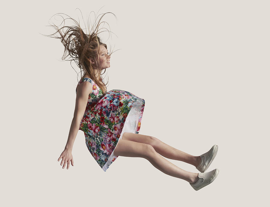 Woman in dress in the air, falling down Photograph by Klaus Vedfelt