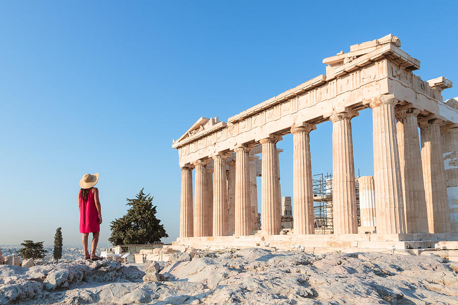 Woman in front of Parthenon temple on the Acropolis, Athens, Greece Photograph by Matteo Colombo