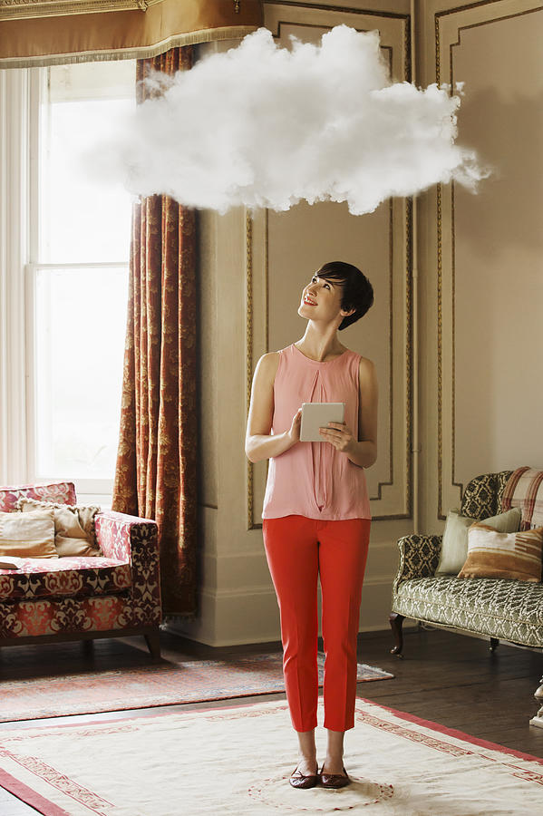 Woman in living room looking at cloud above head Photograph by Anthony Harvie
