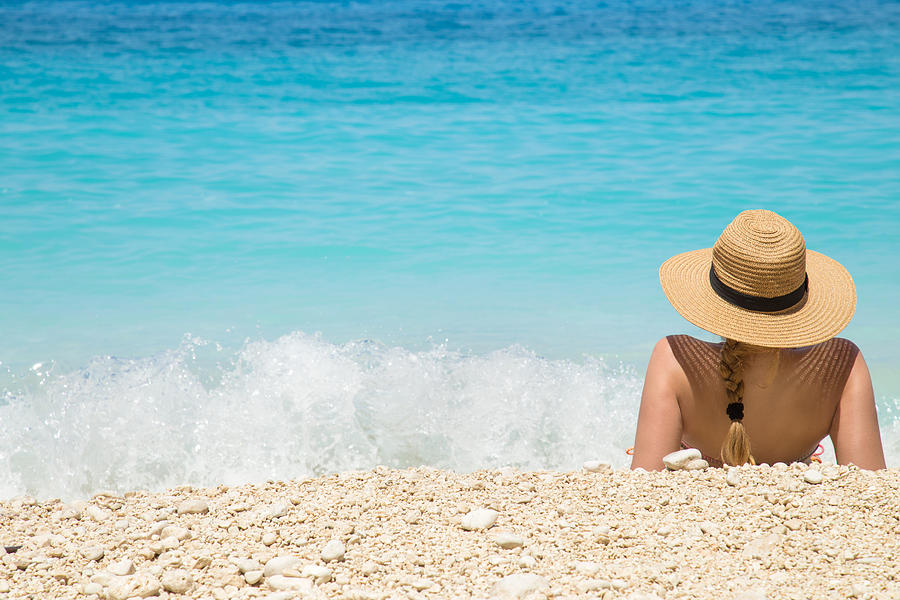 Woman In Summer Hat On Beach Photograph by Milan_Jovic