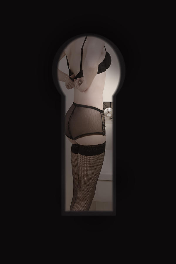 Woman In Underwear Undressing, Through Keyhole Photograph by Andrew Bret Wallis