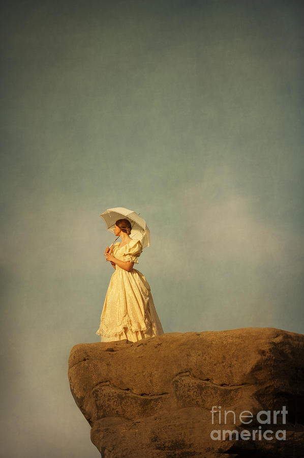 Woman In Victorian Dress On The Edge Of A Cliff Photograph by Lee Avison