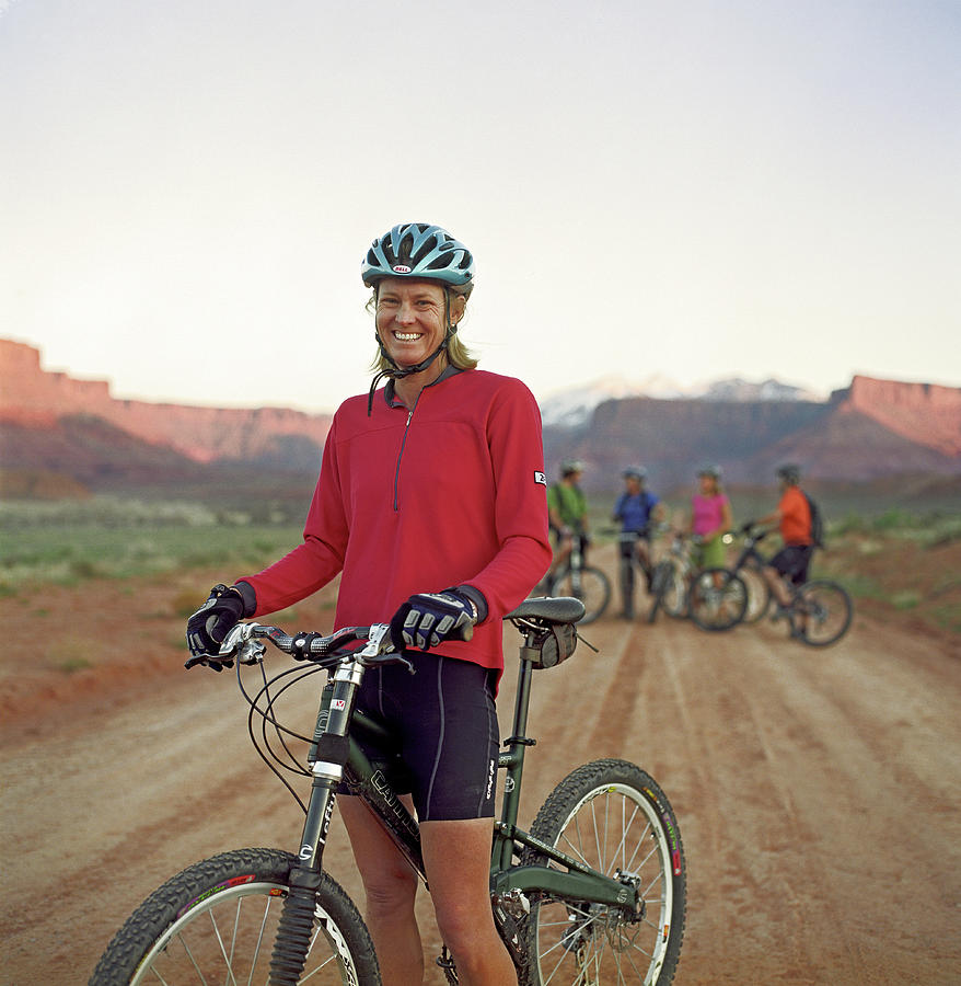 Woman Mountain Biker Smiling At Camera Photograph by Robert Millman ...