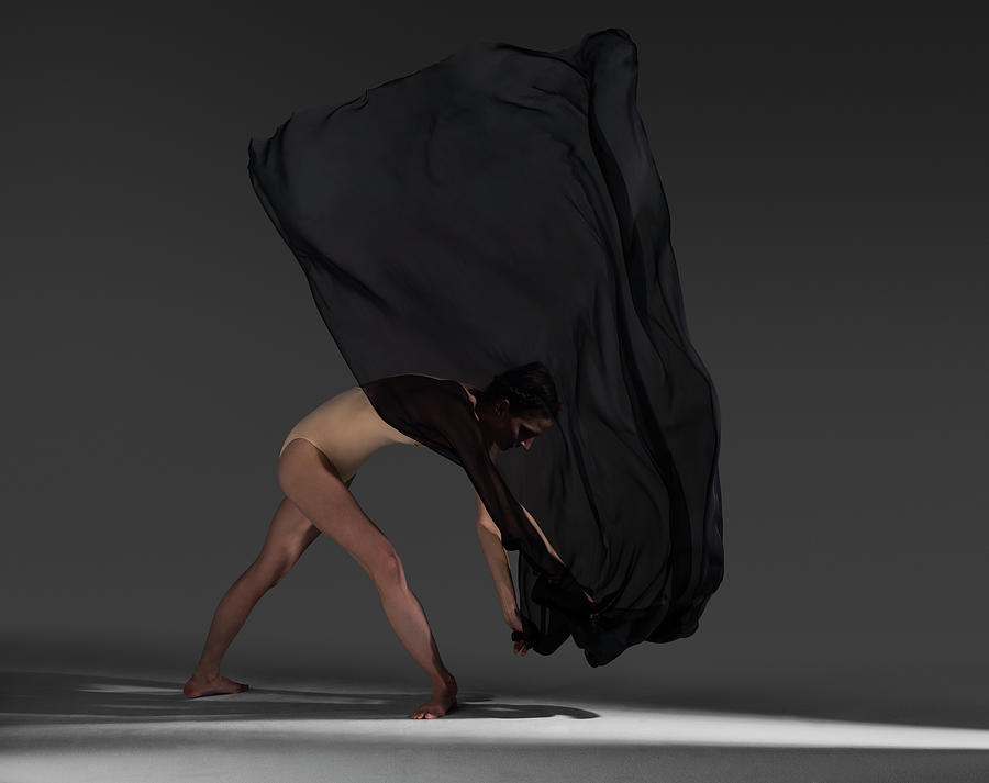 Woman Moving Silk Fabric Through The Air Photograph by Nisian Hughes