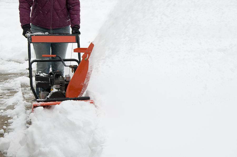 Woman Operating Snowblower Photograph by Terminator1