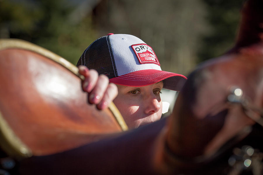 Woman Prepares To Mount A Horse While Photograph by Jess McGlothlin ...