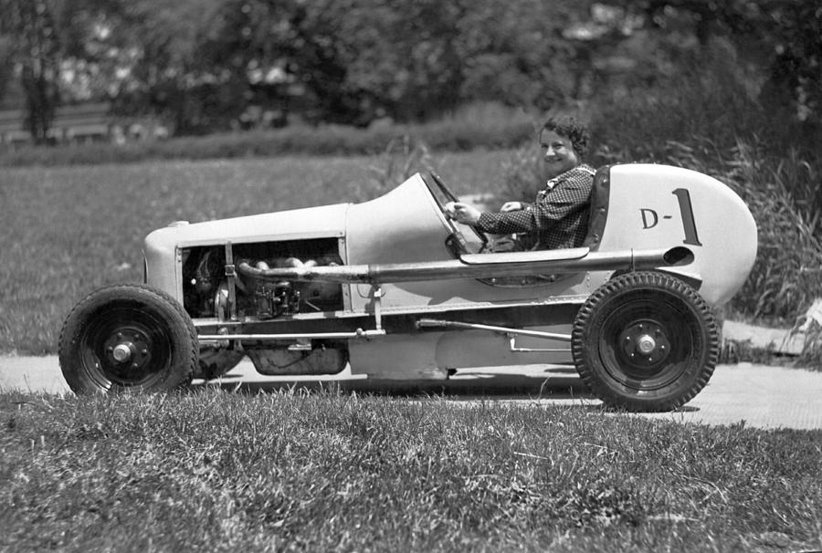 Black And White Photograph - Woman Race Car Driver by Underwood Archives
