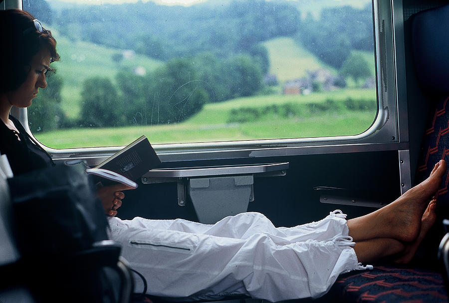 Woman Reading On A Train Photograph