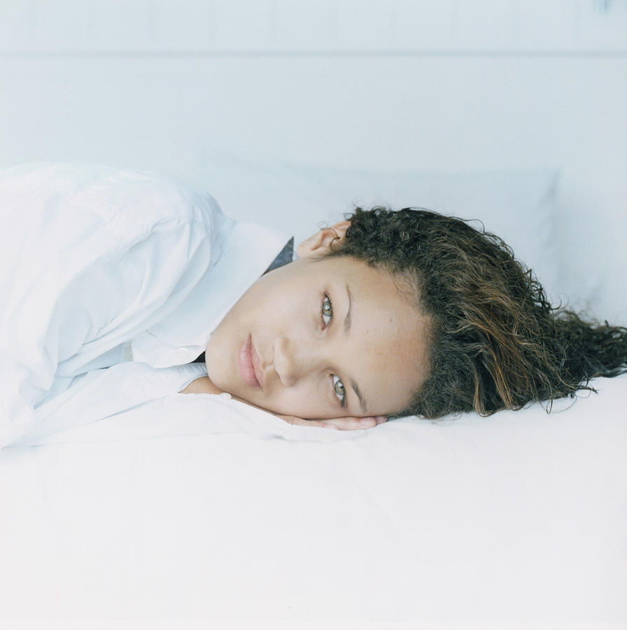 Woman Reclining on Bed Photograph by Jerome Tisne
