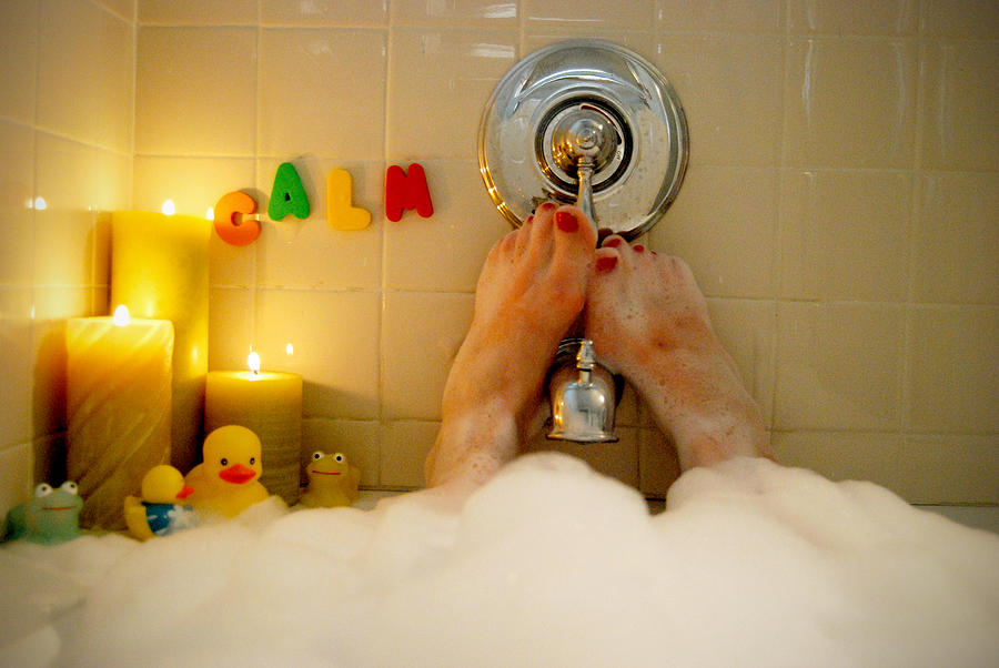 Woman relaxing in a bubble bath Photograph by Amy Frazier, Shooting the Kids Photography