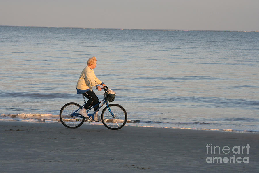 Woman Riding a Bike on the Beach Hilton Head South Carol Photograph by Thomas Marchessault