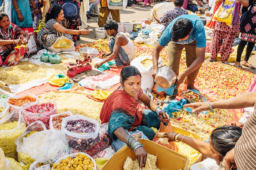 Woman selling pasta at the Chadni Chowk spice markets Photograph by Nikada