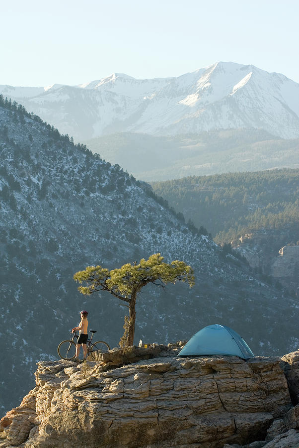 Mountain Photograph - Woman Sets Up Camp,colorado by Kennan Harvey