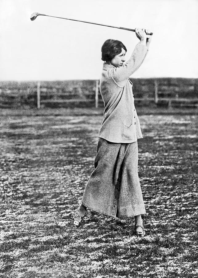 Woman Showing Golf Form Photograph by Underwood Archives
