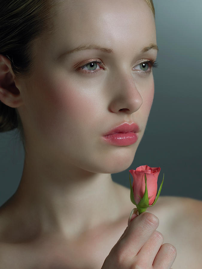 Woman Smelling A Rose by Kate Jacobs/science Photo Library