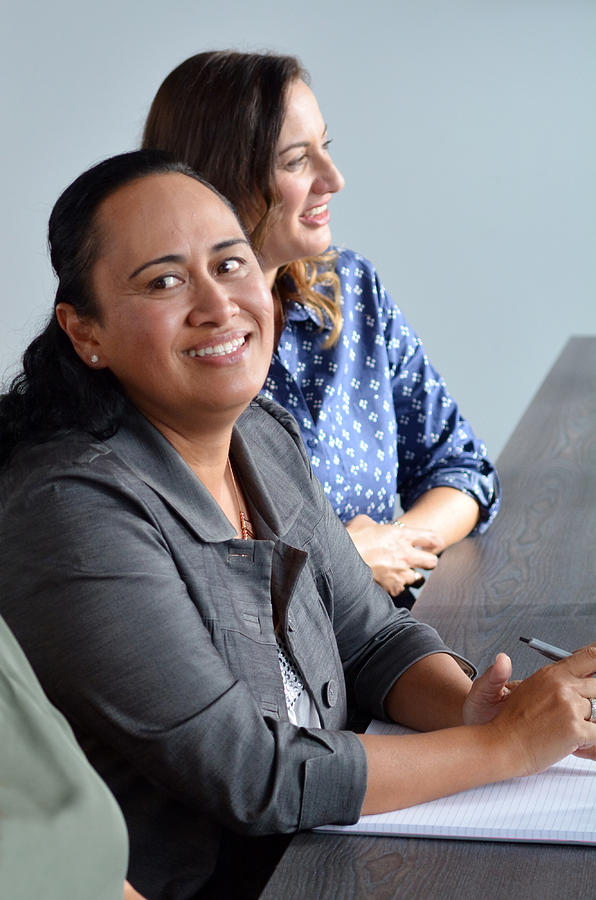 Woman smile during a business meeting Photograph by Rafael Ben-Ari