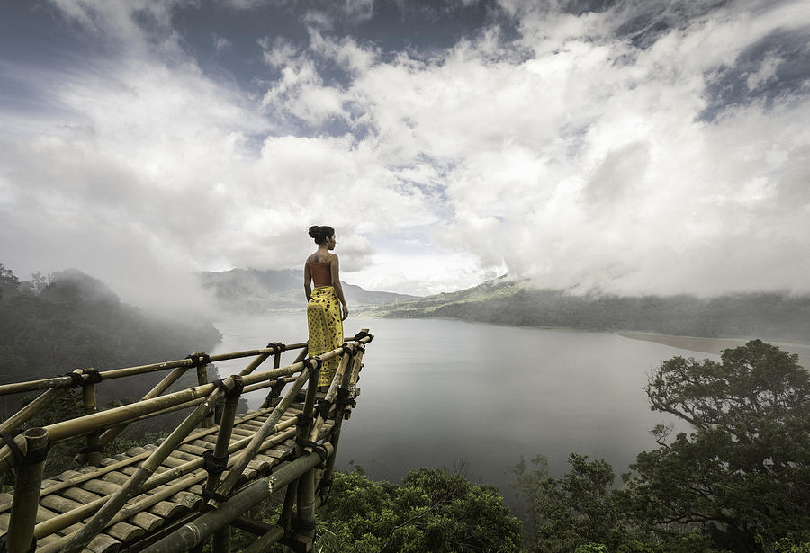 Woman Standing On Bamboo Viewing Platform Photograph by Martin Puddy