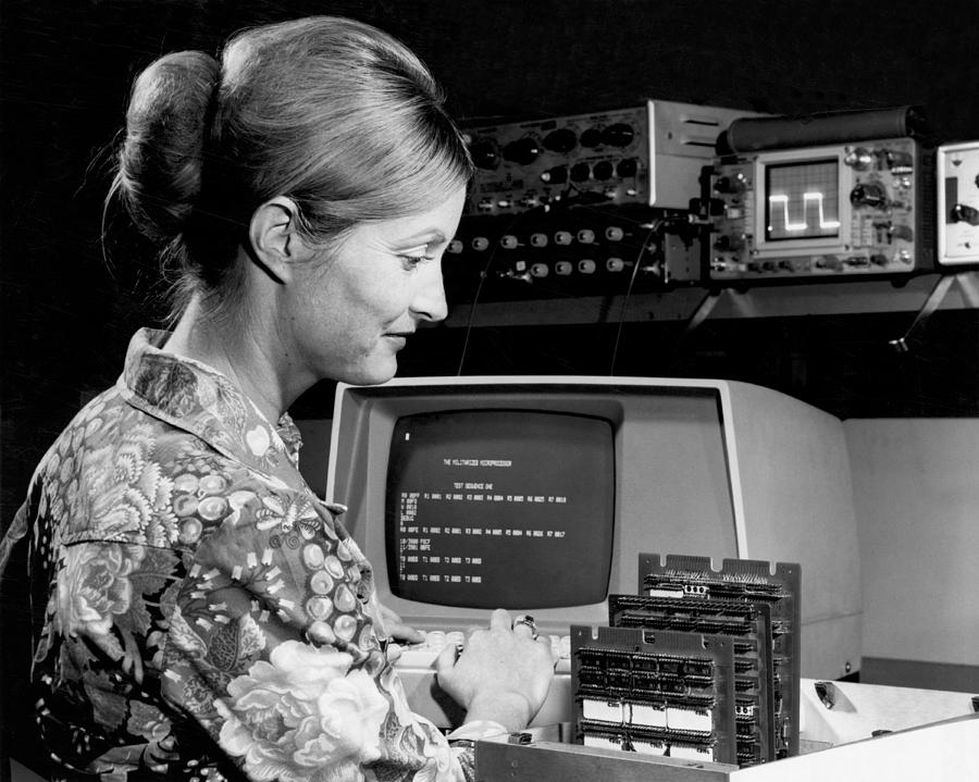Los Angeles Photograph - Woman Testing A Microcomputer by Underwood Archives