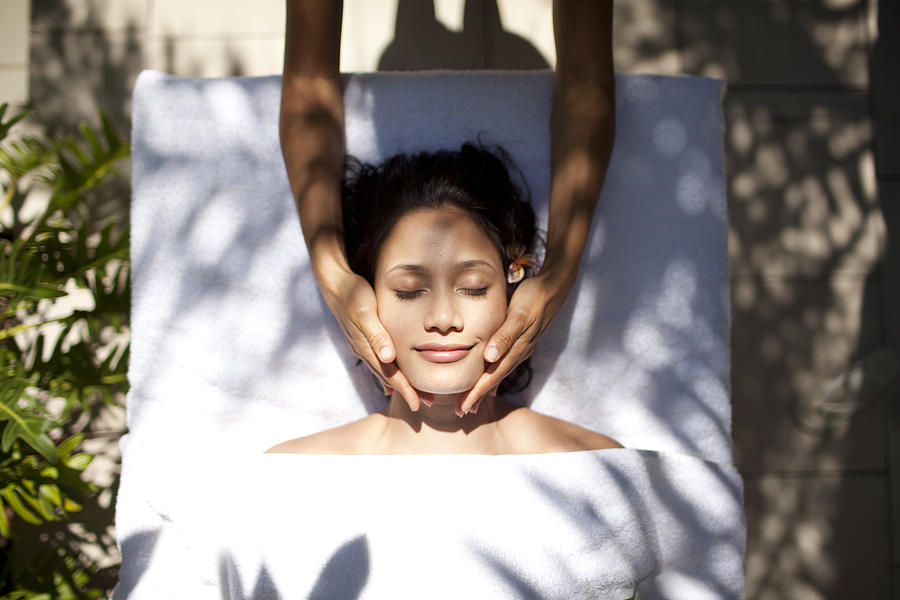 Woman tropical massage facial beauty treatment Photograph by Wander Women Collective
