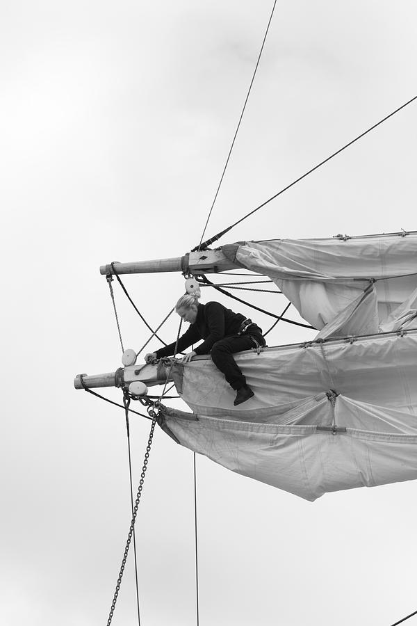 Woman unfastening sails - monochrome Photograph by Ulrich Kunst And Bettina Scheidulin