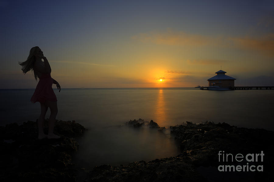 Woman up at sunrise on beach Photograph by Dan Friend
