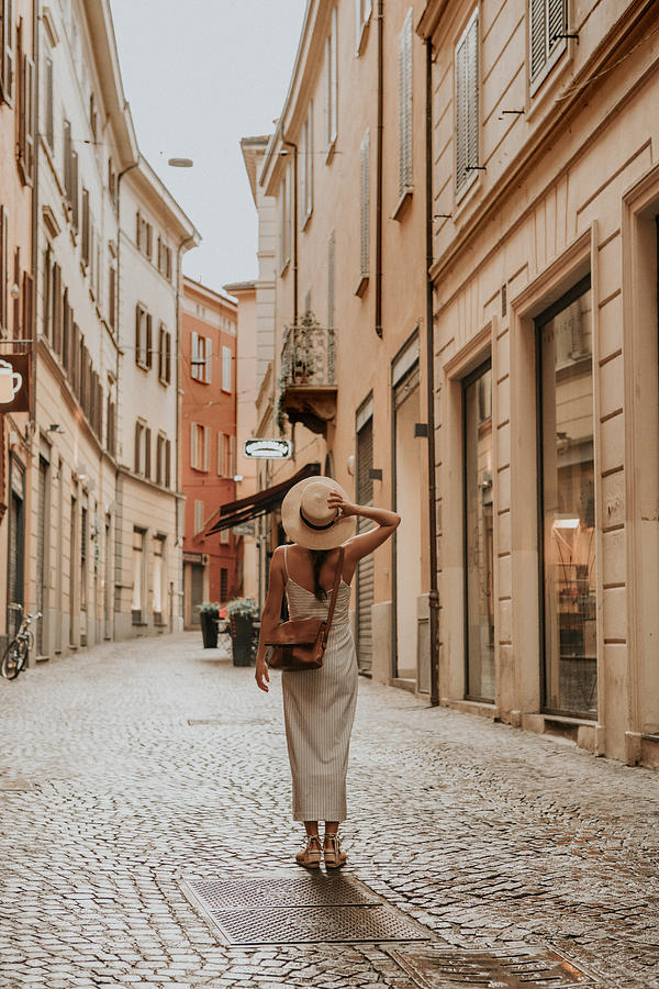 Woman walking in bologna Photograph by Orbon Alija