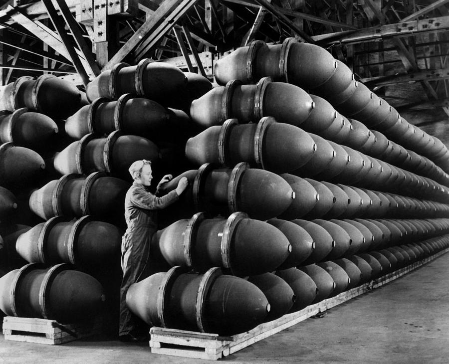 Woman War Worker Checks 1,000 Lb. Bomb by Everett