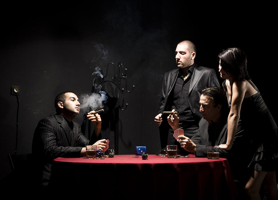 Woman Watching Group of Gangster Men Playing Poker Photograph by 123foto